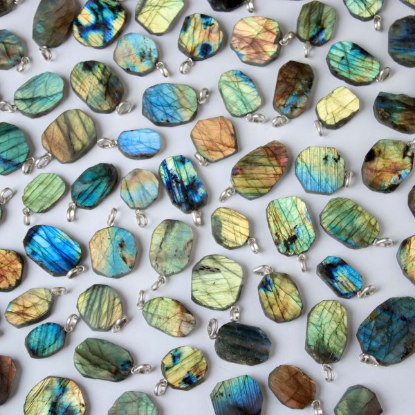 1704Cts. 77Pcs Labradorite Slice pendant free Shape 35X23 To 17X11 mm.