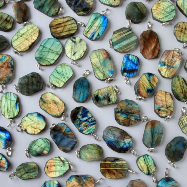 1703Cts. 77Pcs Labradorite Slice pendant free Shape 32X23 To 20X12 mm.